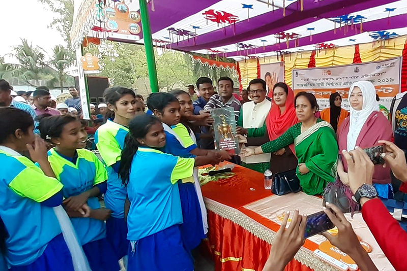 Champions receiving Trophy