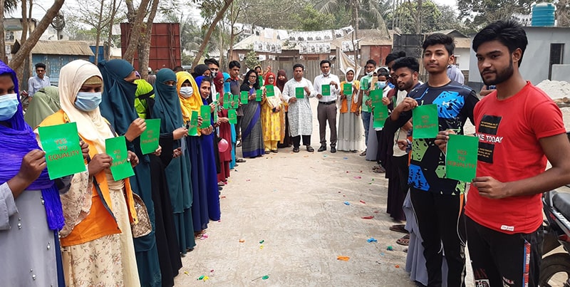 The guests and the youth participants have expressed their solidarity in ensuring equal rights by displaying 'Yes to Equality' card in Jamalpur.